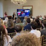 Dr Stephanie Schaller of the USC College of Nursing and NurseEdvance address attendees regarding the CardioEducator at Meet the Finalists