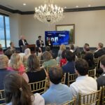Shrihan Ganesh Babu and Sanjana Tripuraneni of CuffWay address attendees at Meet the Finalists