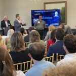 Stijn Van de Velde and Joseph Etris of Drobot address attendees at Meet the Finalists