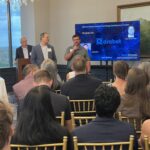 Stijn Van de Velde and Joseph Etris of Drobot address attendees at Meet the Finalists