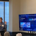 Founder Dieter Haemmerich of OncoBlaze addresses attendees at Meet the Finalists