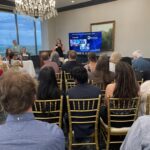 Amanda Clark of PulManage addresses attendees at Meet the Finalists