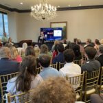 Tom Schipper of Querri addresses attendees at Meet the Finalists
