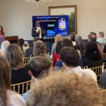 Christopher Williams of STEM U LLC addresses attendees at Meet the Finalists