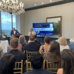 Kristin Parker of Shared City Charleston addresses attendees at Meet the Finalists