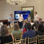 Jordan Fowler and his team from Shaw Circle address attendees at Meet the Finalists
