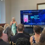 Sheryl Barbosa of Sustain Cities Network addresses attendees at Meet the Finalists