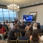 Joey Loman of SynergyMill FabLab addresses attendees at Meet the Finalists