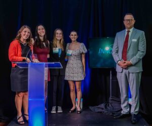 Students and representatives from the SC Governor's School for Science & Mathematics Seeds to Shoreline initiative accept the award for the Young Innovators Award from Ruben Hentzschel of Worthwhile at the 2025 InnoVision Awards