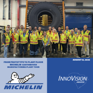 InnoVision Michelin US10 Plant Tour group photo in front of Earthmover tire